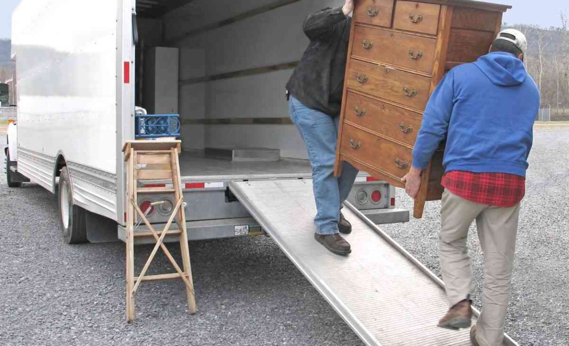 bigstock-Two-men-carry-chest-of-drawers-30407189-1200x1000